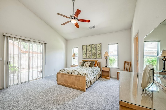 2869 E Brandon Ln, Fresno, CA 93720 - bedroom featuring access to outside, high vaulted ceiling, multiple windows, and light carpet