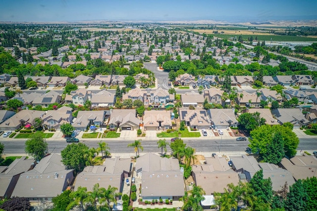 2869 E Brandon Ln, Fresno, CA 93720 - aerial view of property and surrounding area featuring nearby suburban area