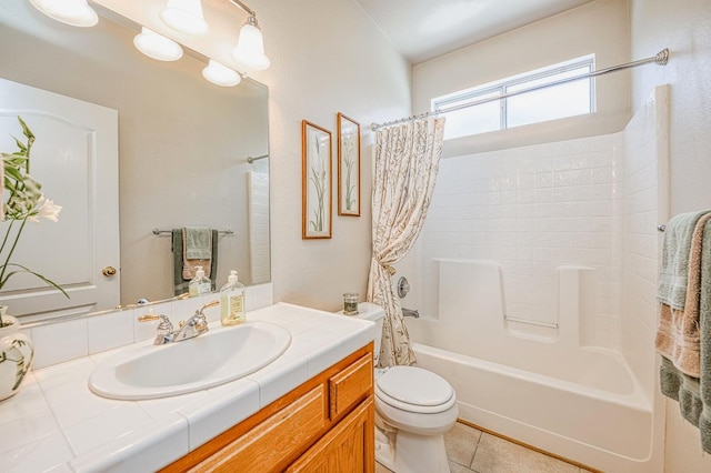2869 E Brandon Ln, Fresno, CA 93720 - bathroom featuring shower / tub combo with curtain, vanity, and tile patterned flooring