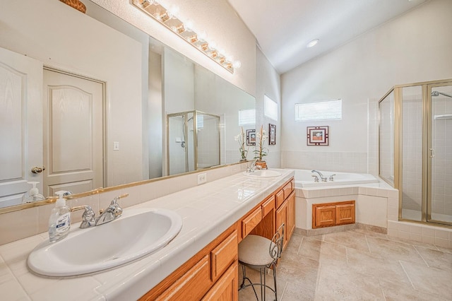 2869 E Brandon Ln, Fresno, CA 93720 - full bath featuring a stall shower, double vanity, a garden tub, and lofted ceiling
