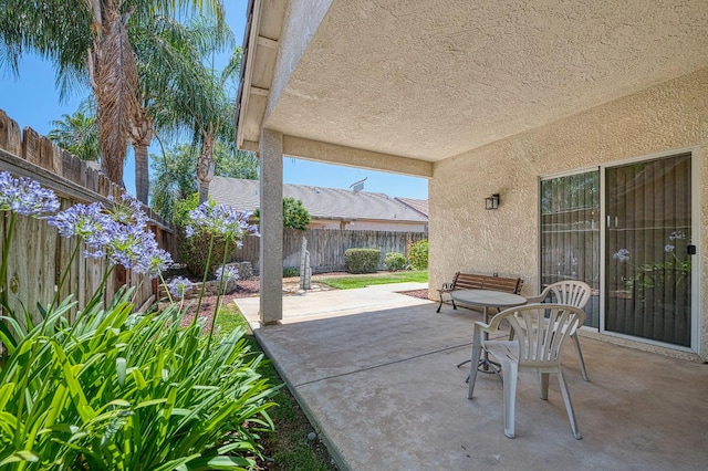 2869 E Brandon Ln, Fresno, CA 93720 - fenced backyard with a patio area