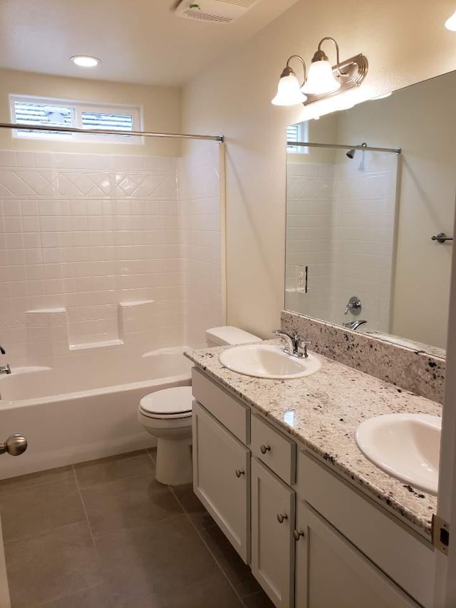 3869 Griffith Ave, Clovis, CA 93619 - bathroom with double vanity, tub / shower combination, and tile patterned floors