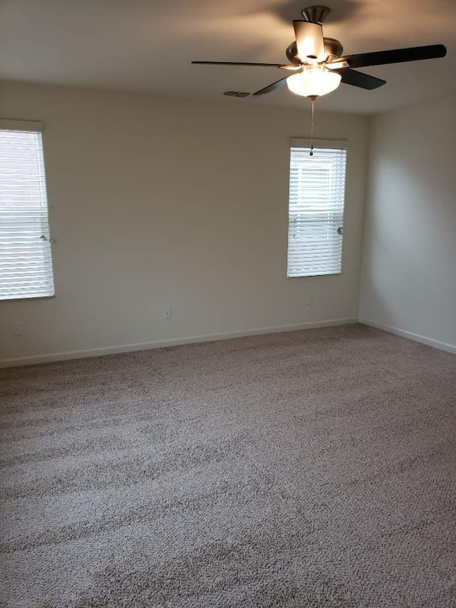 3869 Griffith Ave, Clovis, CA 93619 - empty room with a ceiling fan and light carpet