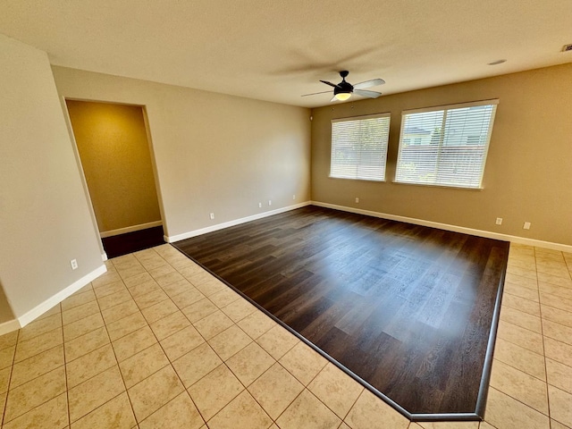 4074 Heritage Ln, Clovis, CA 93619 - tiled spare room featuring ceiling fan and baseboards