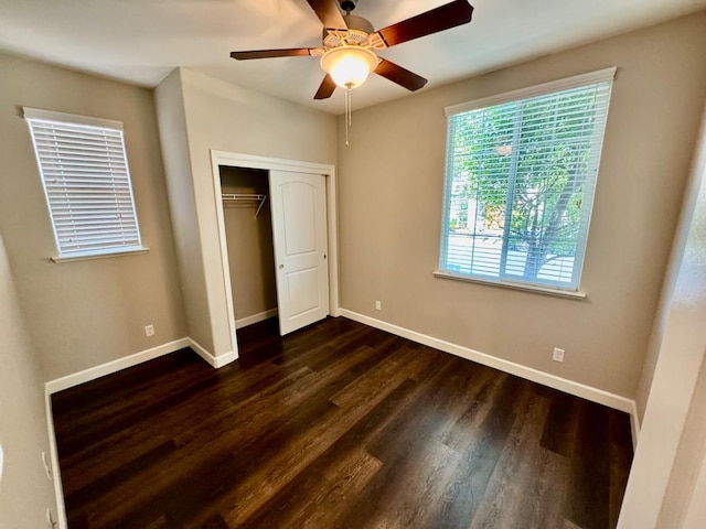 4074 Heritage Ln, Clovis, CA 93619 - unfurnished bedroom featuring dark wood-type flooring, a closet, and ceiling fan