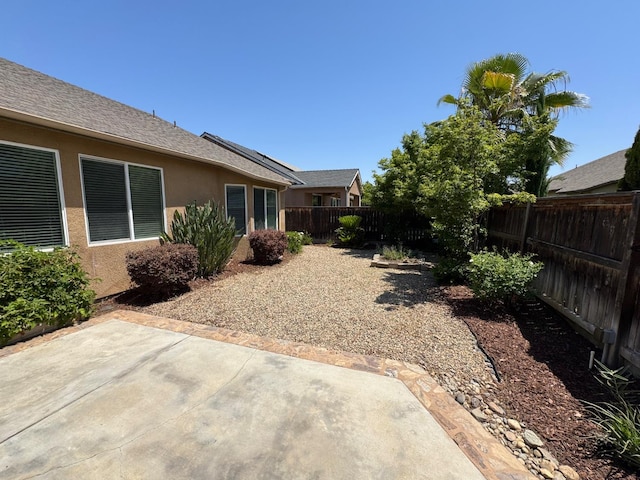 4074 Heritage Ln, Clovis, CA 93619 - fenced backyard with a patio
