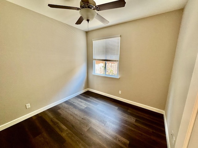 4074 Heritage Ln, Clovis, CA 93619 - spare room with dark wood-type flooring and a ceiling fan