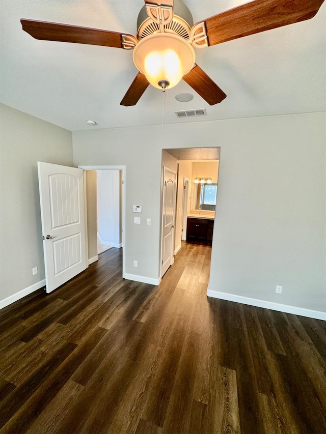 4074 Heritage Ln, Clovis, CA 93619 - unfurnished bedroom featuring dark wood-type flooring and ceiling fan