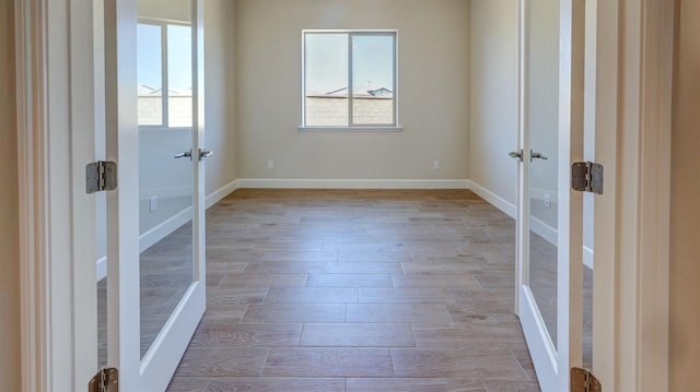 925 Talus Way S, Madera, CA 93636 - spare room featuring french doors and light wood-style floors