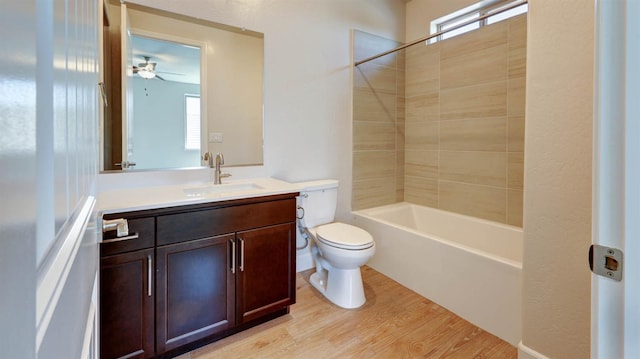 925 Talus Way S, Madera, CA 93636 - bathroom with wood finished floors, vanity, a ceiling fan, and shower / bathtub combination