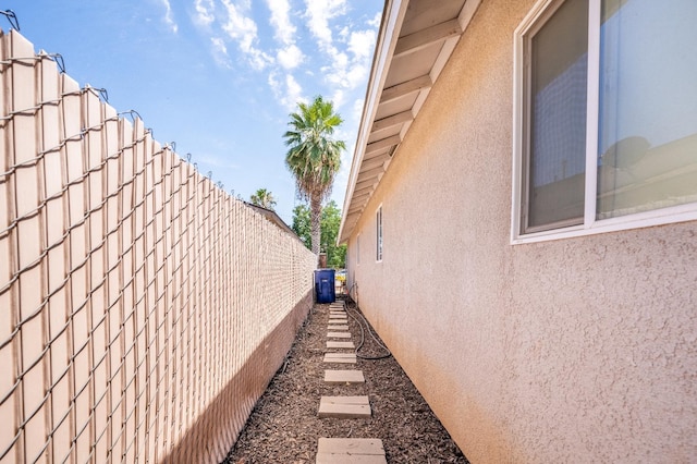 51 E Tuolumne St, Fresno, CA 93706 - view of property exterior featuring stucco siding and a cooling unit