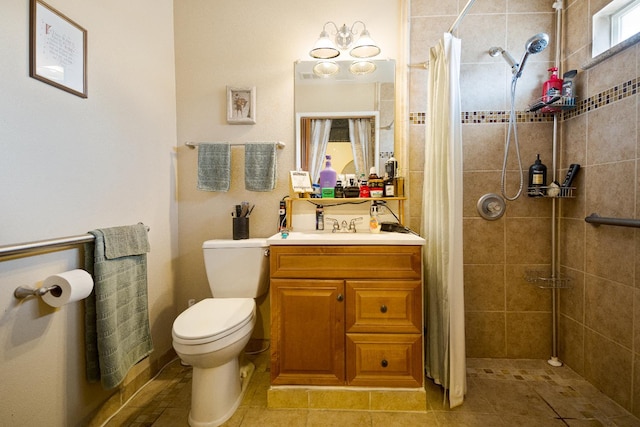51 E Tuolumne St, Fresno, CA 93706 - bathroom featuring vanity, tiled shower, and tile patterned floors