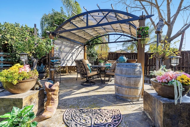 2639 Maine Ave, Clovis, CA 93619 - fenced backyard with outdoor dining area and a patio