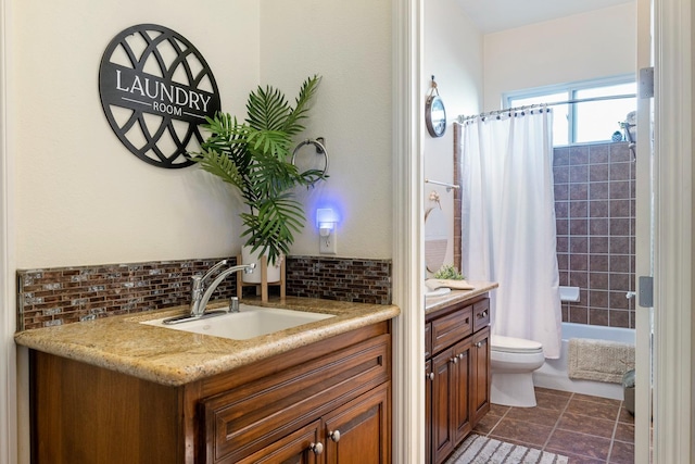 2639 Maine Ave, Clovis, CA 93619 - full bath featuring vanity, decorative backsplash, and shower / bathtub combination with curtain