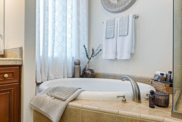 2639 Maine Ave, Clovis, CA 93619 - bathroom with a garden tub and vanity