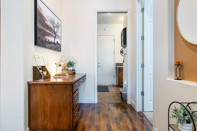 2639 Maine Ave, Clovis, CA 93619 - hall featuring dark wood finished floors and baseboards