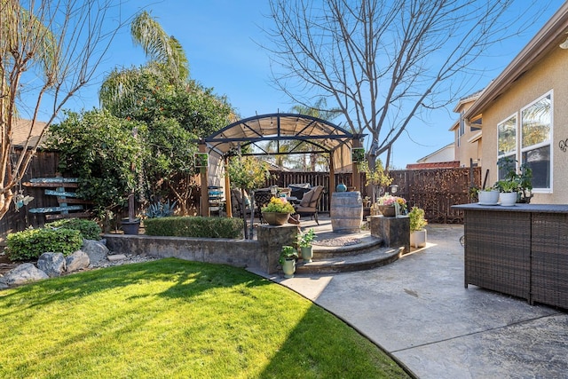 2639 Maine Ave, Clovis, CA 93619 - fenced backyard with a patio and an outdoor hangout area