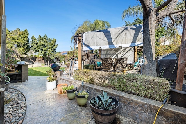2639 Maine Ave, Clovis, CA 93619 - fenced backyard with a patio