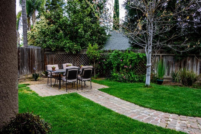 9930 N Rowell Ave, Fresno, CA 93720 - fenced backyard with a patio