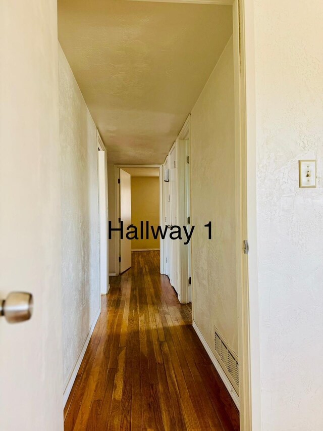 3646 E Dayton Ave, Fresno, CA 93726 - corridor with hardwood / wood-style floors and baseboards