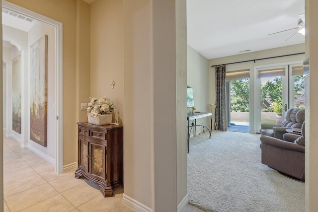 4638 W Lark Ct, Visalia, CA 93291 - hall with light tile patterned floors and baseboards