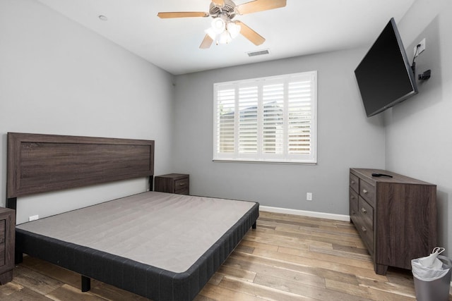 5313 W King Fisher Ln, Fresno, CA 93722 - bedroom featuring light wood-style flooring and a ceiling fan