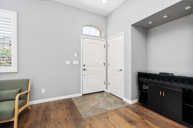 5313 W King Fisher Ln, Fresno, CA 93722 - entryway featuring plenty of natural light, wood finished floors, and recessed lighting