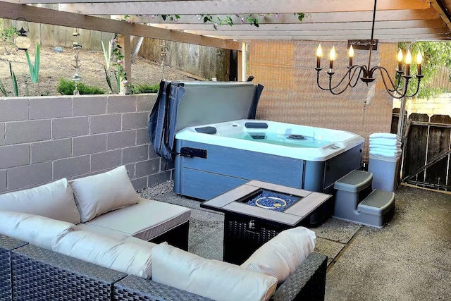 40885 Elliott Dr, Oakhurst, CA 93644 - view of patio / terrace featuring an outdoor living space with a fire pit and a hot tub
