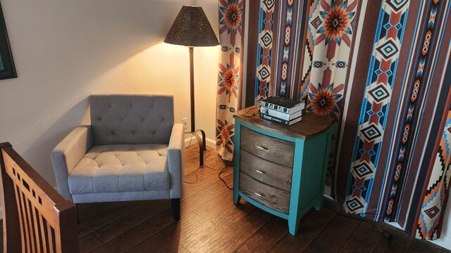 40885 Elliott Dr, Oakhurst, CA 93644 - living area featuring dark wood-style floors and baseboards