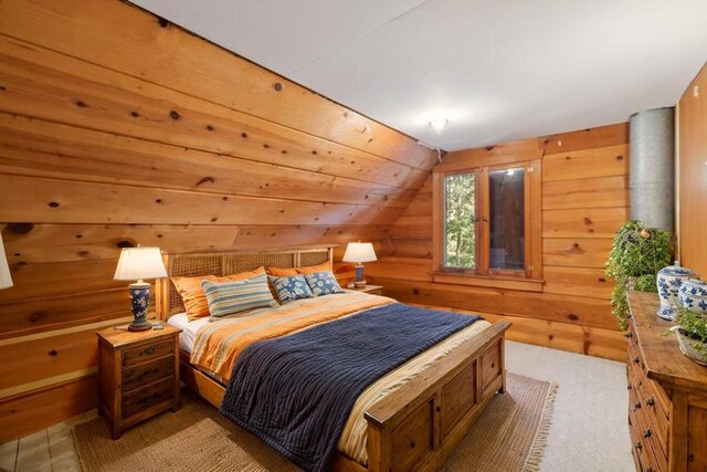 83634 Presidents Ln, Wilsonia, CA 93633 - bedroom featuring lofted ceiling, wooden walls, and carpet