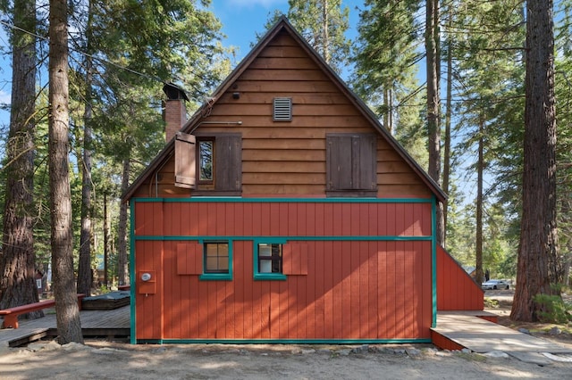 83634 Presidents Ln, Wilsonia, CA 93633 - view of side of home featuring a chimney