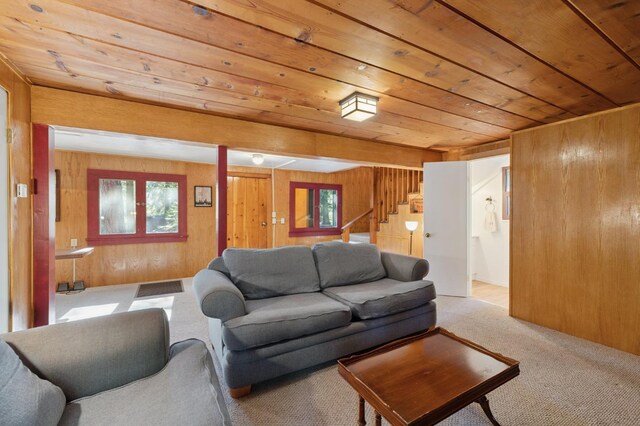 83634 Presidents Ln, Wilsonia, CA 93633 - carpeted living room with wood ceiling, wooden walls, and stairway