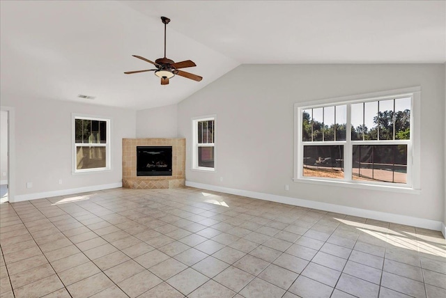 46453 Opah Dr, Ahwahnee, CA 93601 - unfurnished living room featuring a ceiling fan, light tile patterned floors, lofted ceiling, and a fireplace
