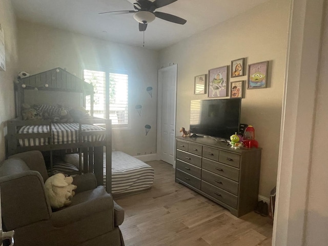 803 E Aretha Ave, Fowler, CA 93625 - bedroom with light wood finished floors and a ceiling fan