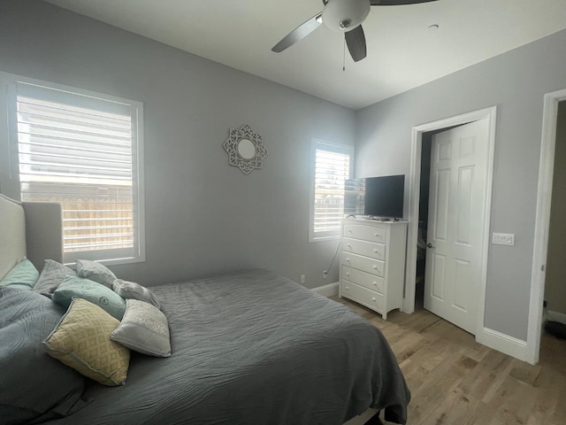 803 E Aretha Ave, Fowler, CA 93625 - bedroom with light wood-style floors and a ceiling fan