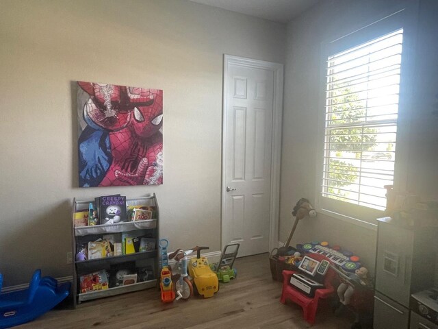 803 E Aretha Ave, Fowler, CA 93625 - playroom featuring wood finished floors