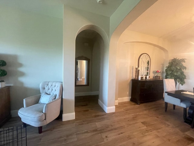 803 E Aretha Ave, Fowler, CA 93625 - sitting room featuring arched walkways and wood finished floors