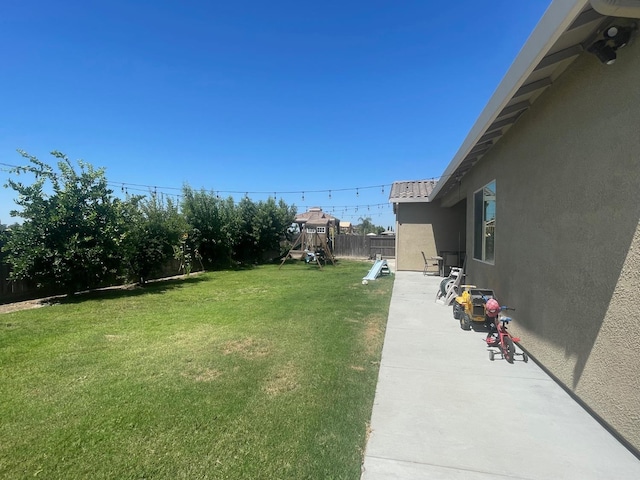 803 E Aretha Ave, Fowler, CA 93625 - view of yard featuring a playground