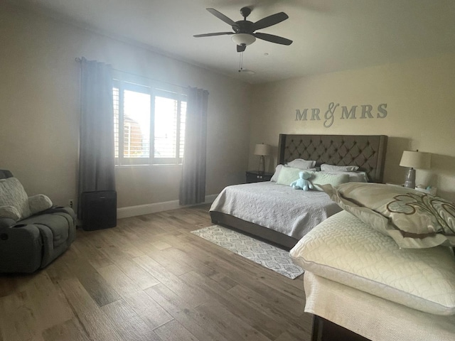 803 E Aretha Ave, Fowler, CA 93625 - bedroom featuring wood finished floors and ceiling fan