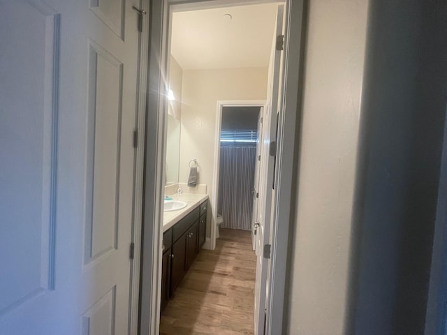 803 E Aretha Ave, Fowler, CA 93625 - bathroom featuring vanity and wood finished floors