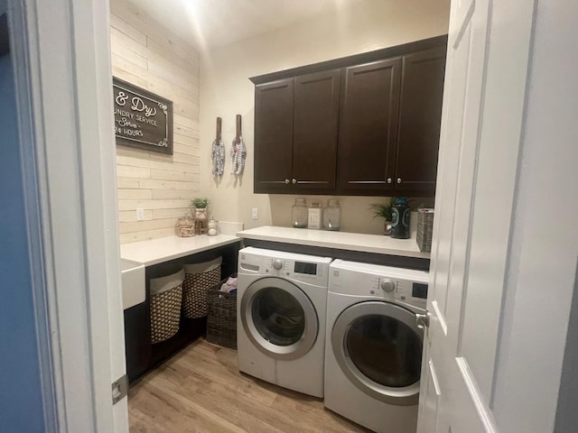 803 E Aretha Ave, Fowler, CA 93625 - laundry room with cabinet space, independent washer and dryer, and light wood-style floors
