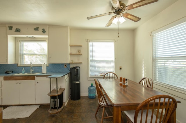 211 S 4th St, Fowler, CA 93625 - dining space with plenty of natural light and a ceiling fan
