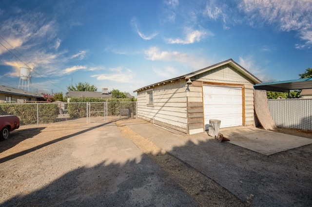 211 S 4th St, Fowler, CA 93625 - detached garage featuring a gate