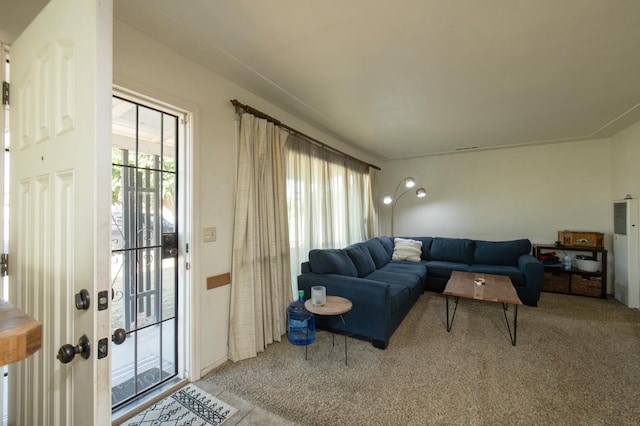 211 S 4th St, Fowler, CA 93625 - living room with a heating unit and light carpet