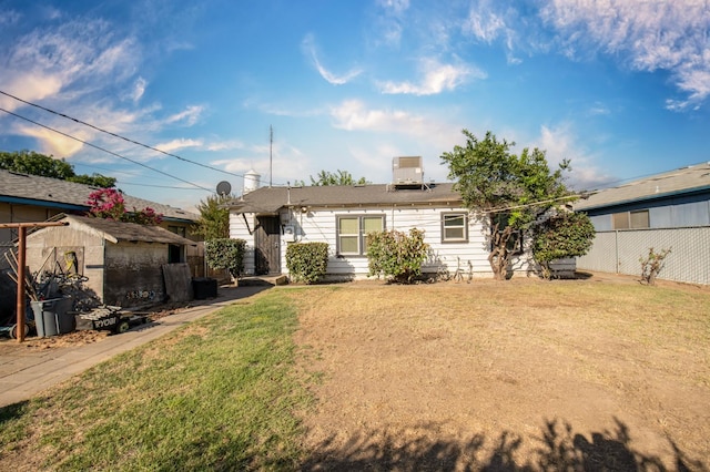 211 S 4th St, Fowler, CA 93625 - back of house with a shed
