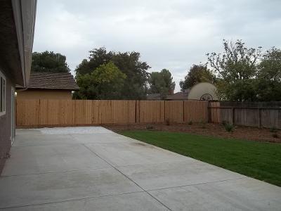 1139 W Alluvial Ave, Fresno, CA 93711 - fenced backyard with a patio