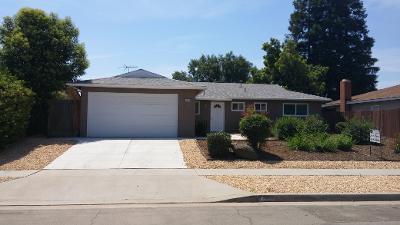 1139 W Alluvial Ave, Fresno, CA 93711 - ranch-style home featuring an attached garage and concrete driveway
