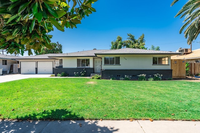 4558 E Weldon Ave, Fresno, CA 93703 - ranch-style house with brick siding, concrete driveway, a garage, and stucco siding
