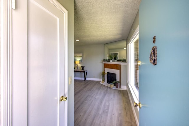 3364 E Princeton Ave, Fresno, CA 93703 - hall with a textured ceiling and wood finished floors