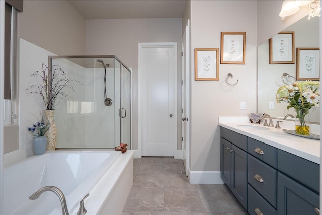 602 Pinnacle Dr W, Madera, CA 93636 - bathroom with vanity, a stall shower, a bath, and tile patterned floors
